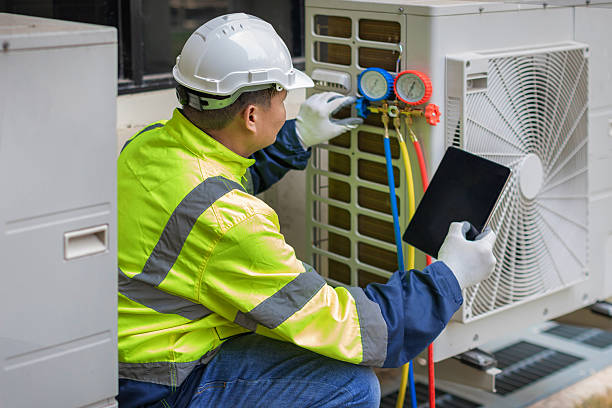 Professional Ac Installation technician working in Washington Grove, MD